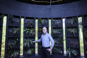 Hotel owner Steve Cuddy inside his cupcake-shaped wedding venue he built in his garden in Coleshill, Warwickshire.
