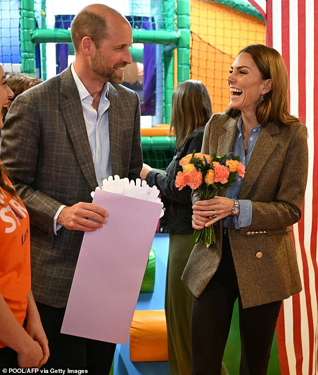 The Prince and Princess were gifted a bouquet of flowers as they visited the soft play area at the Aros Hall community hub
