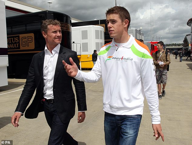 Di Resta walks the grid with fellow Scot David Coulthard, himself an esteemed former F1 driver