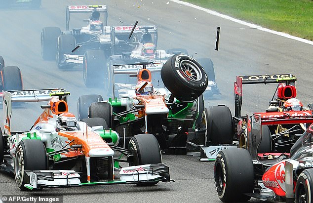 Di Resta crashes into the back of Romain Grosjean's Lotus at the Italian Grand Prix in 2013