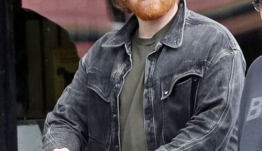 Rupert Grint was every inch the doting dad on Friday as he pushed new baby Goldie in a pram during a low-key stroll in Highgate, North West London