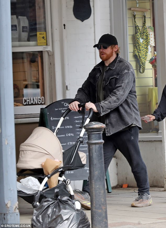Attempting to go incognito, Rupert covered his bright red locks with a sports cap and added a pair of dark shades