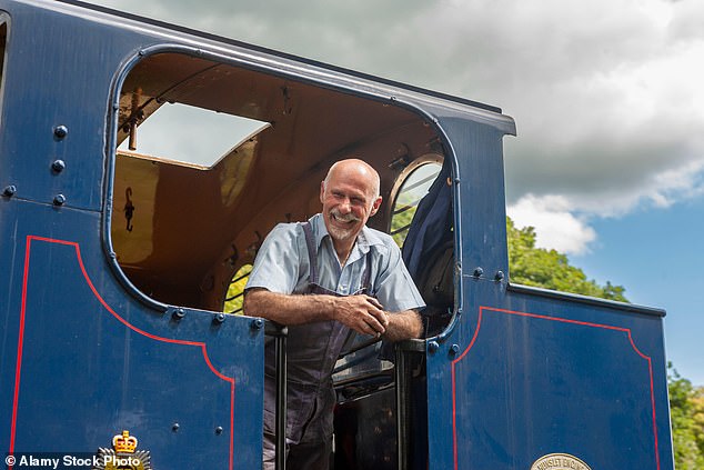 Make sure to stop halfway at Smallbrook Junction for a side-journey on the Isle of Wight Steam Railway, pictured