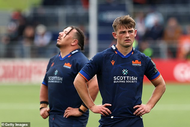 Javan Sebastian (left) and Ross Thompson are dejected at full-time after Saturday's defeat