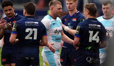 Finn Russell commiserates with Edinburgh winger Darcy Graham after Edinburgh's defeat