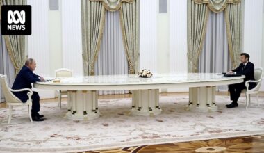 What it's like sitting at Vladimir Putin's very long negotiating table