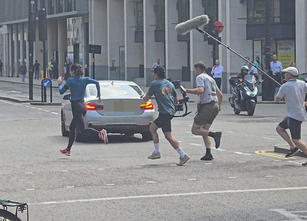 The Israeli actress was filmed sprinting down Aldersgate Gate in east London with a camera crew hot on her heels as they shot her every move, but can you guess it is?