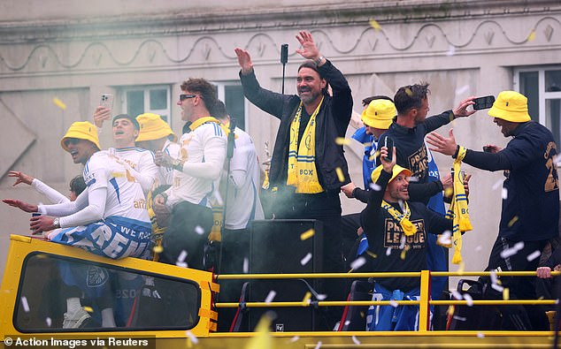 Leeds manager Daniel Farke (centre) enjoyed the celebrations after guiding them to promotion