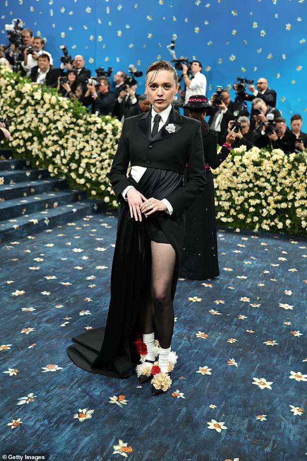 Aimee's outfit was the creation of London designer Priya Ahluwalia, according to Vogue. It featured playful touches like rumple white mid-calf socks and Cartier diamonds