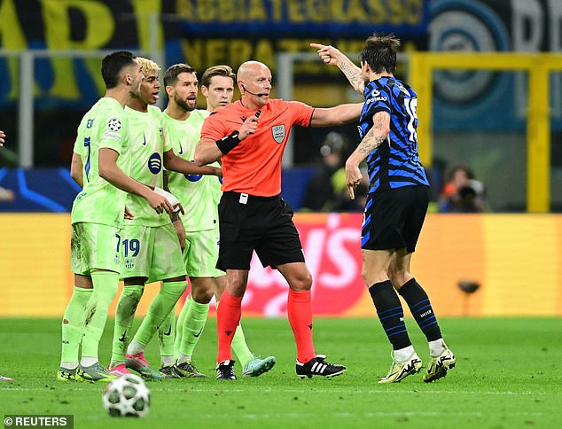 Acerbi was incensed and called upon referee Szymon Marciniak to punish the player (centre)