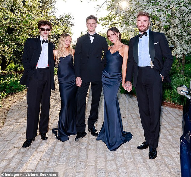 Victoria Beckham's rift with her son Brooklyn has become 'her worst nightmare,' sources have claimed (pictured with husband David, sons Romeo and Cruz and daughter Harper)