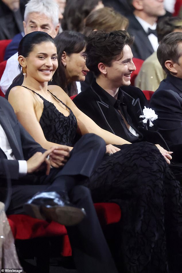 Proving their romance is stronger than ever, Kylie and Timothee put on a loved-up display as they took their seat in the audience