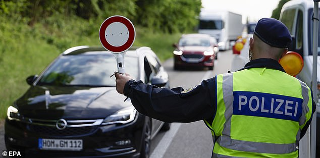 A German police officer at a checkpoint near the border with France, in Lauterbourg, Germany, 07 May 2025