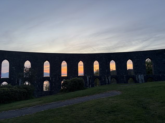 A view of Oban's sunset from inside McCaig¿s Tower which is a short uphill walk from the pier