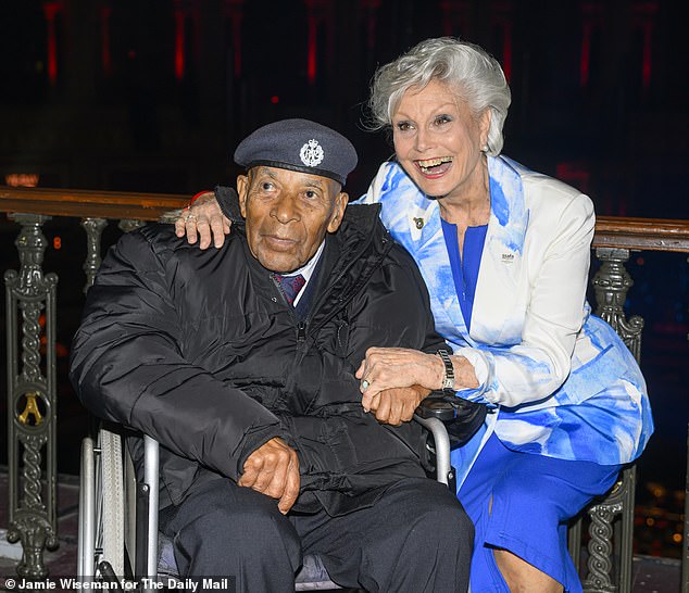 Angela Rippon smiled alongside Veteran Gilbert Clarke