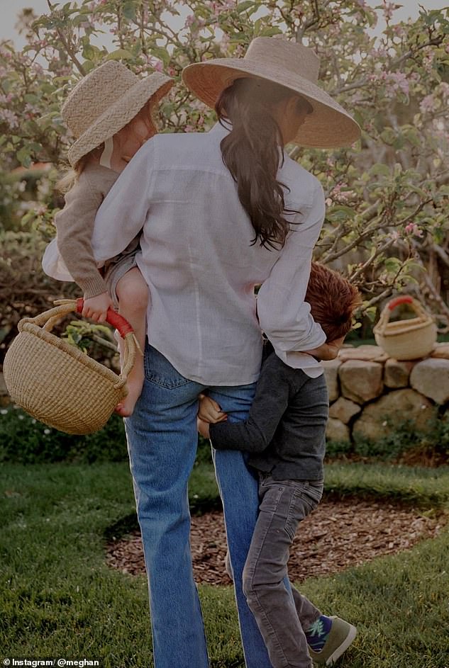 The charity is raising funds in light of Archie and Lilibet's birthdays this year (pictured with Meghan)