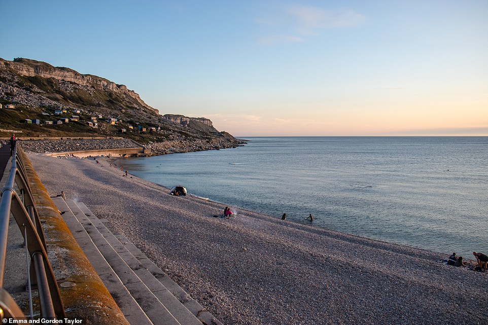 Chesil Cove in Dorset, pictured above in this breathtaking photo, is found at 'the southernmost end of the iconic Chesil Beach' and was 'formed by the accumulation of pebbles over a staggering 7,000 years'