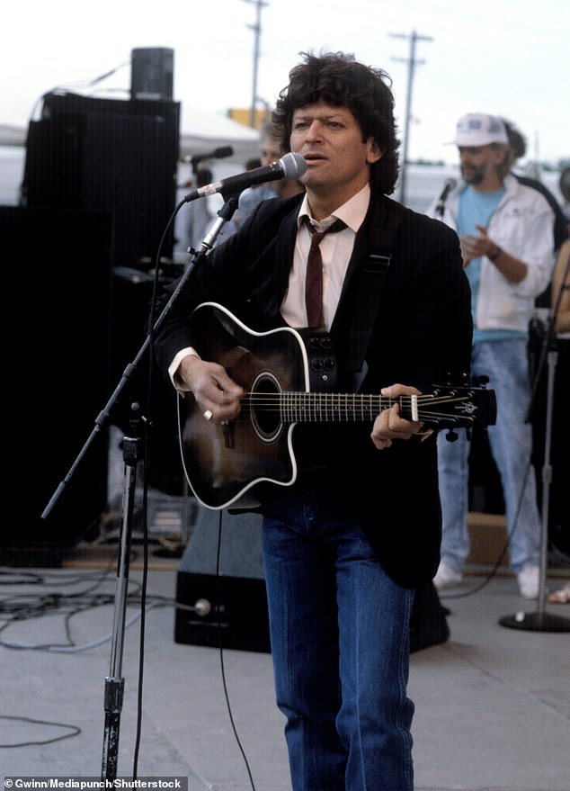 The Texas-born singer, who had a string of number one hits in the 1970s, passed away on Friday after being admitted to hospice care (pictured performing in Nashville in 1988)