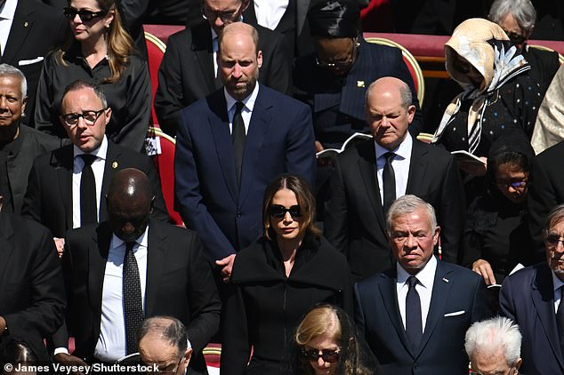 Prince William represented his father the King and was seated next to then-German Chancellor Olaf Sholz