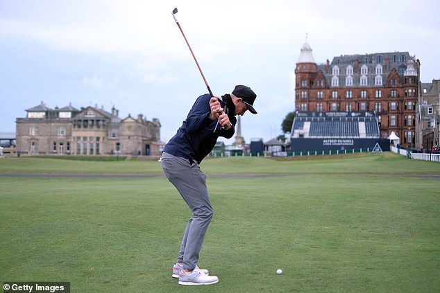 England cricketer Joe Root pictured teeing off in golf's 'Hickory Challenge' prior to the Alfred Dunhill Links Championship on the Old Course St. Andrews in September 2022
