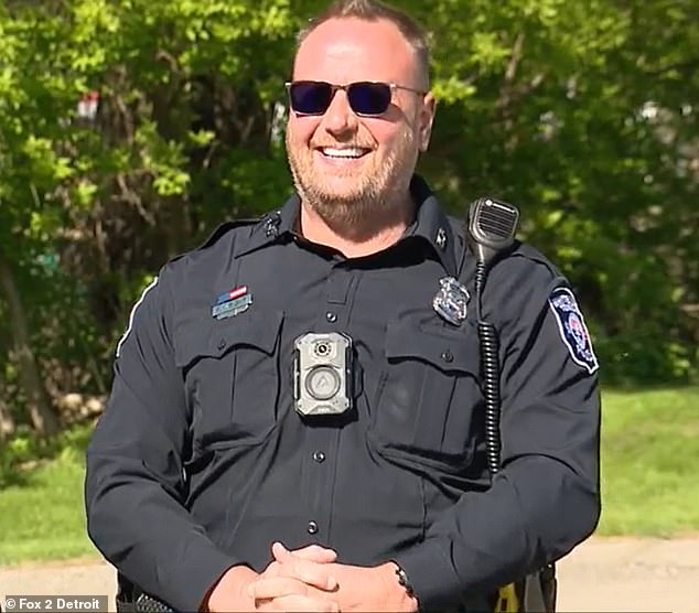 Tragically, two of the three fawns were already dead - but Wright quickly noticed that one was showing signs of a fight (pictured: Officer Wright)