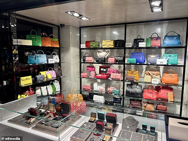 The alleged robbers were armed with knives and stole Hermes handbags worth more than £70,000 from the upmarket boutique