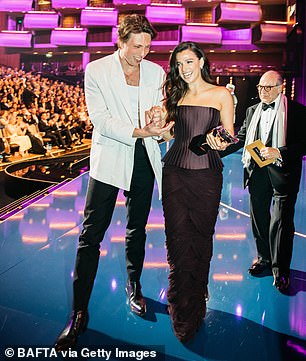 Abela's fiancé joined her onstage as she made her way to the winners room with her newly acquired TV BAFTA Award