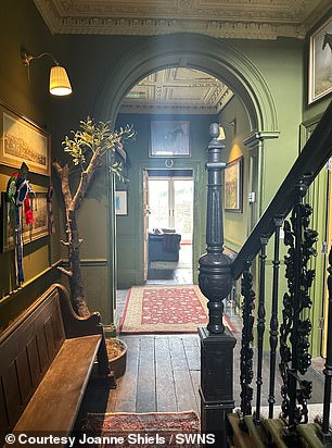 The staircase of the house pictured after renovations