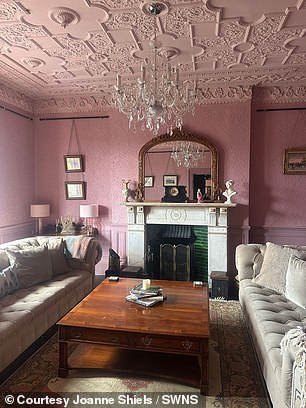 (Living room pictured after restoration)