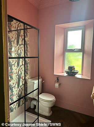 The couple installed two additional bathrooms (pictured after restoration)