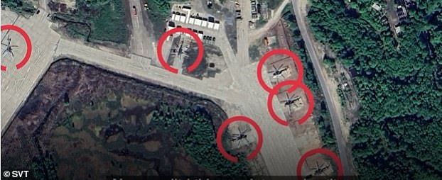 AFTER: Helicopters are pictured along the runway at the Severomorsk-2 airbase