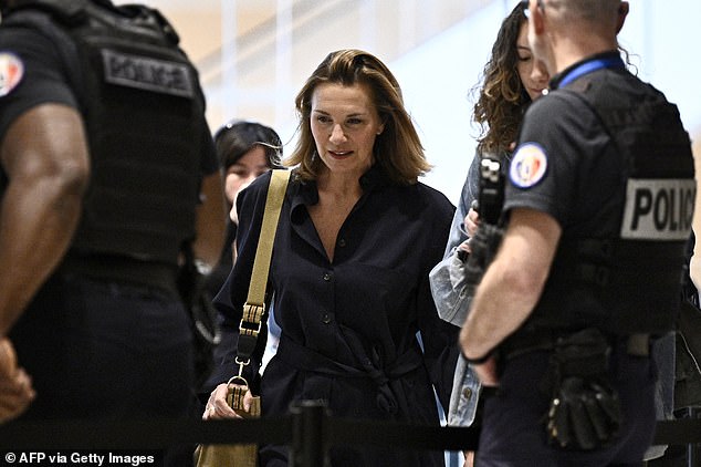 Set designer Amelie (pictured) told the court that Depardieu had trapped her between his legs as she tried to pass him in a corridor before he began touching her body