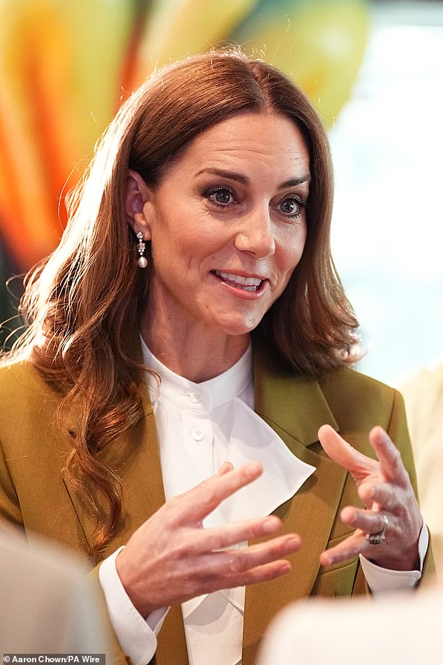 Kate was elegant as ever as she sported a khaki blazer and trousers from Victoria Beckham this morning