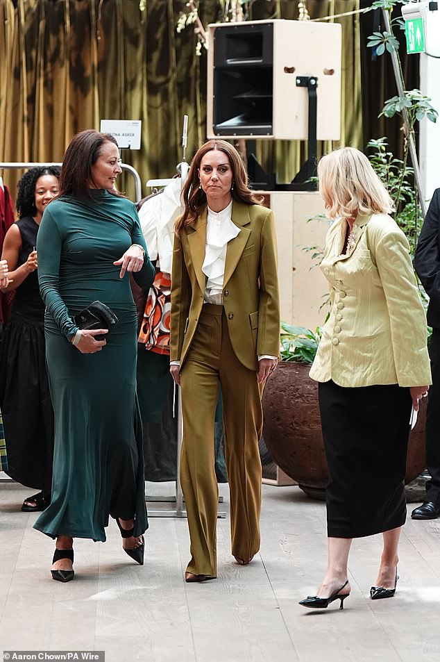 The Princess of Wales pictured with Caroline Rush, outgoing CEO of the British Fashion Council, and her replacement Laura Weir (right), at the British Fashion Council