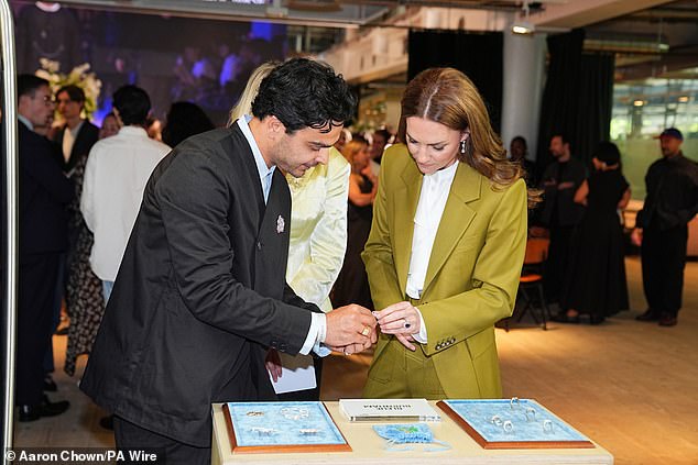 Kate was treated to a tour of designs during a visit to the British Fashion Council to present the Queen Elizabeth II Award for British Design