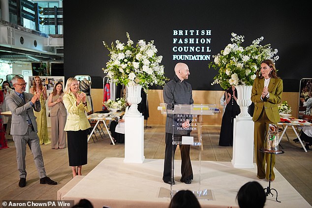 The Queen Elizabeth II Award for British Design was first presented to Richard Quinn in February 2018 - when Queen Elizabeth II made her first visit to London Fashion Week