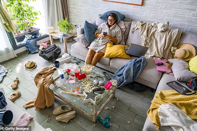 Some people think messiness is a sign you might have ADHD - but diagnosing the condition is not that simple (picture posed by model)