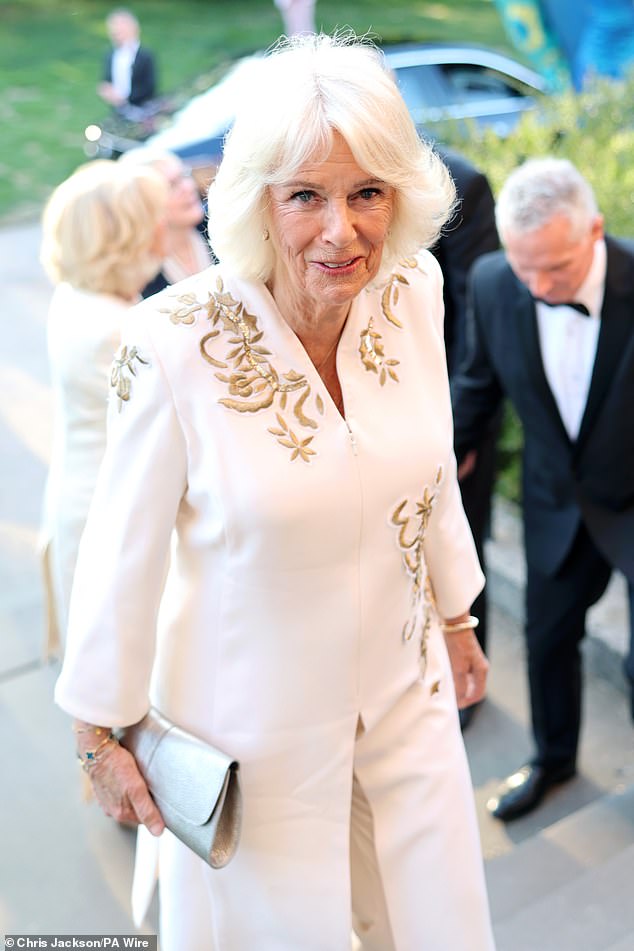 Queen Camilla looked elegant in a light cream tunic over matching trousers as she attended the event, organised by the charity her late brother, Mark Shand, founded