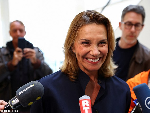 Plaintiff Amelie K reacts as she speaks to members of the media at the courthouse, as the court convicted French actor Gerard Depardieu of sexual assault of two women