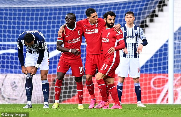 Roberto Firmino (centre) formed a formidable attacking trio alongside Sadio Mane (left0 and Mohamed Salah (right) at Liverpool