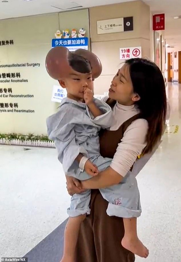 Qibao pictured with his mother