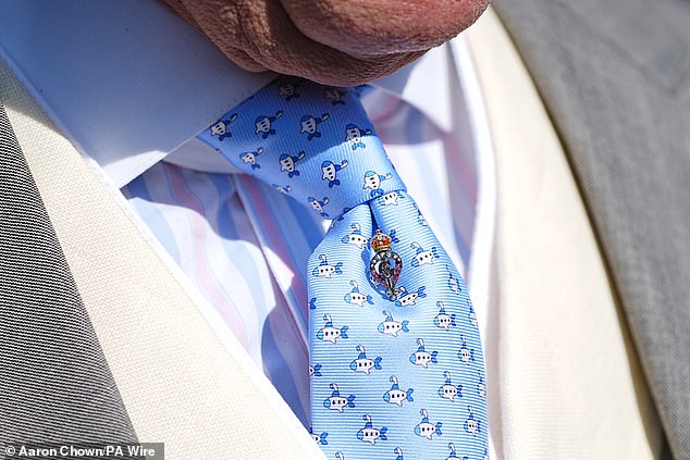Charles' tie boasted an interesting pattern. The pale blue grosgrain-type fabric featured a small submarine print