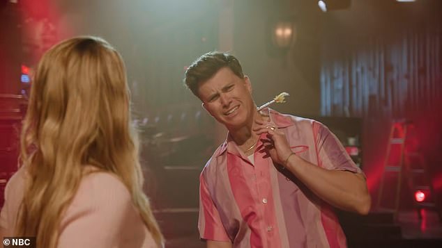 Jost is suddenly struck in the neck by a dart
