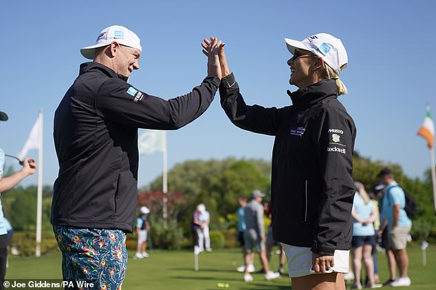 Mike and Zara high-five during the Mike Tindall Celebrity Golf Classic at the Belfry Golf & Resort Hotel in Sutton Coldfield