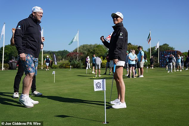 Mike and Zara on the golf course at the Belfry hotel as the former England rugby player wore  printed golf shorts featuring a bold print of peacock feathers in a sartorial choice that tickled his followers
