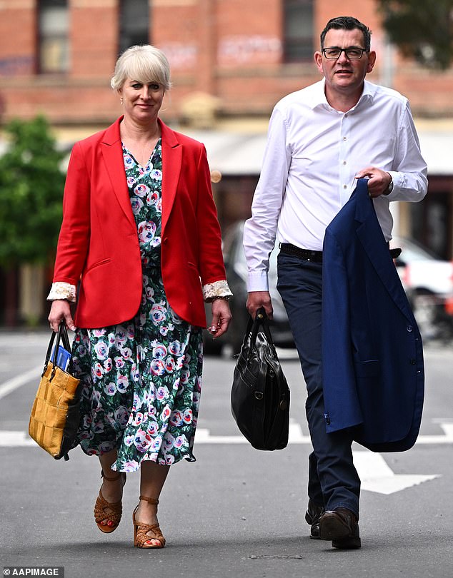 Andrews (pictured with wife Cath) led Victoria through Covid and earned the nickname 'Dictator Dan' after making Melbourne the world's most locked down city
