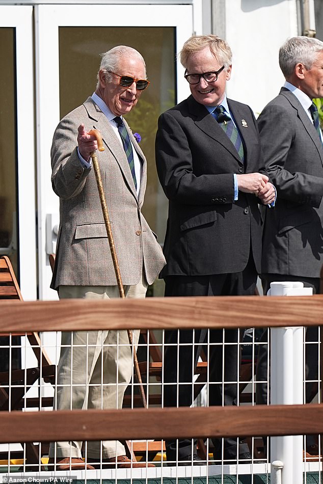 The royal was snapped enjoying a conversation while attending the show