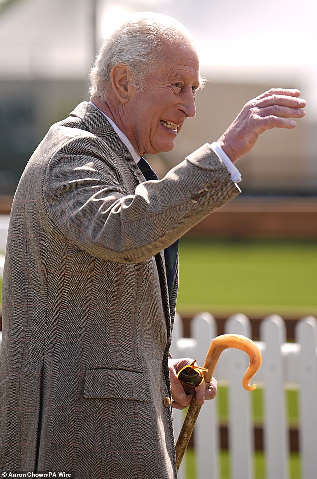 King Charles was pictured smiling and waving at the crowds during his appearance at the equestrian event on Saturday