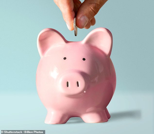 Money in the bank: Britons put away 9.9 per cent of their incomes for a rainy day over the past 12 months