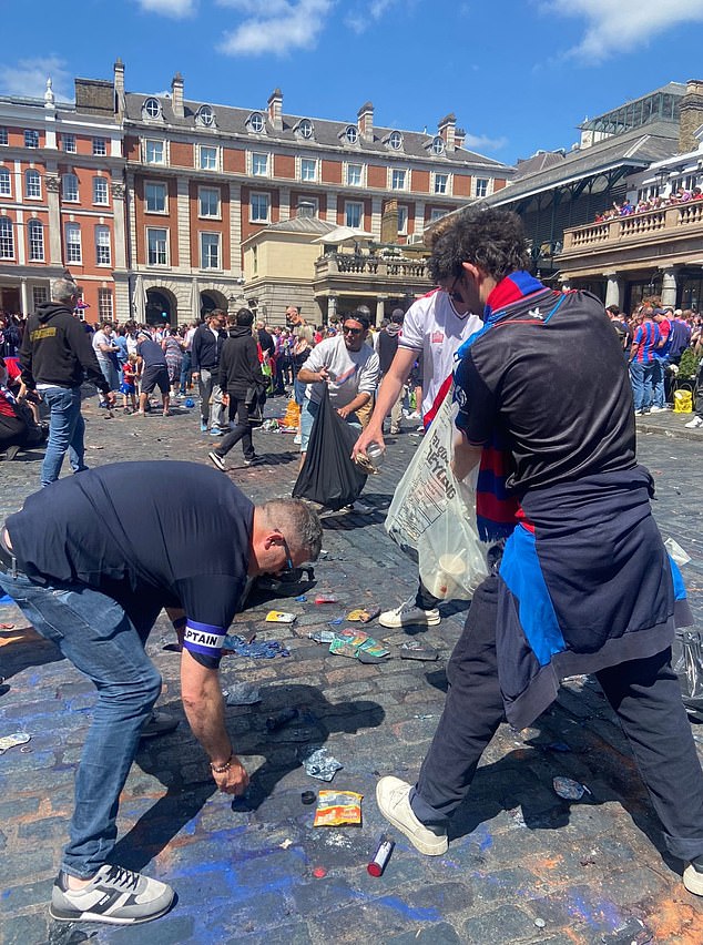Crystal Palace fans were seen helping to clear up rubbish in central London